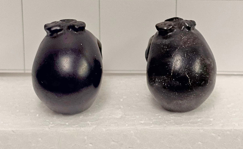 Obsidian carved Skulls with Flowers