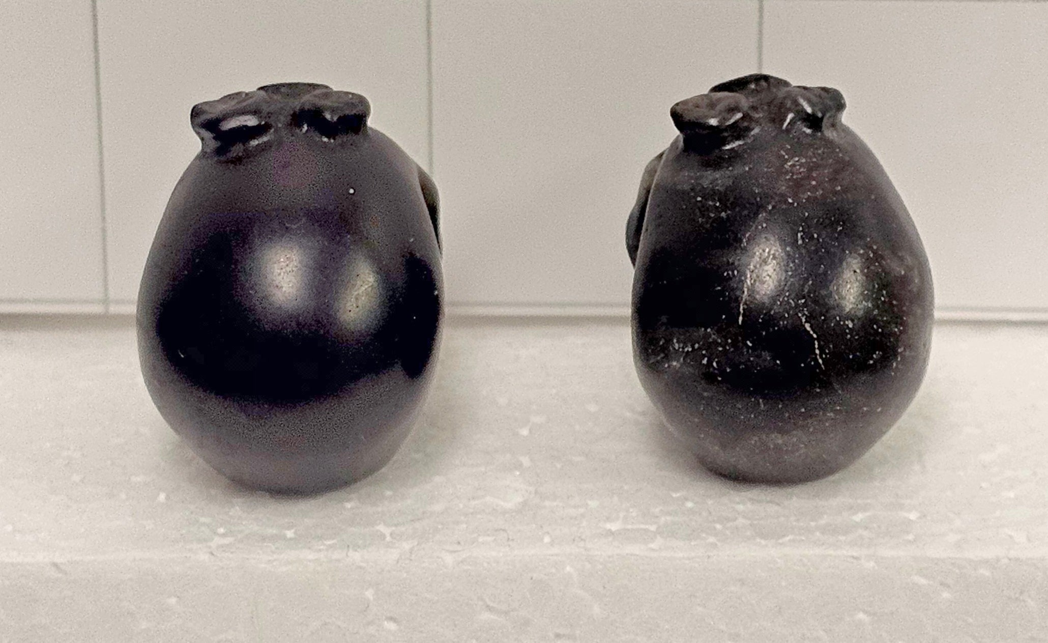 Obsidian carved Skulls with Flowers