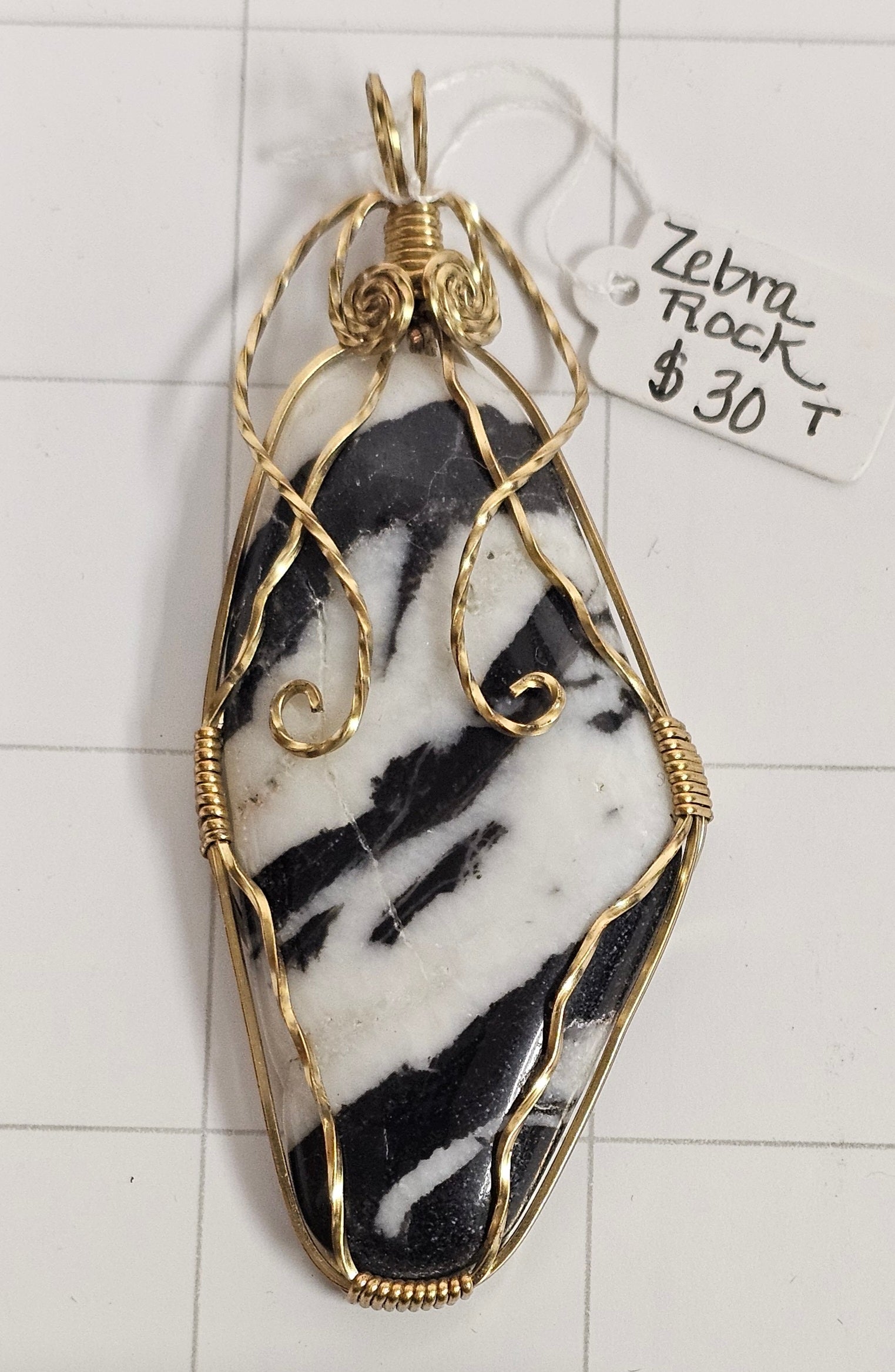 Zebra stone wrapped pendant