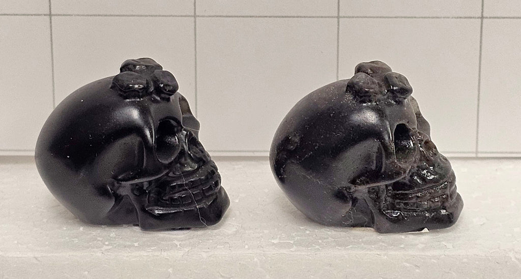 Obsidian carved Skulls with Flowers